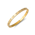 Bracelet jonc cœurs zirconiums dorés