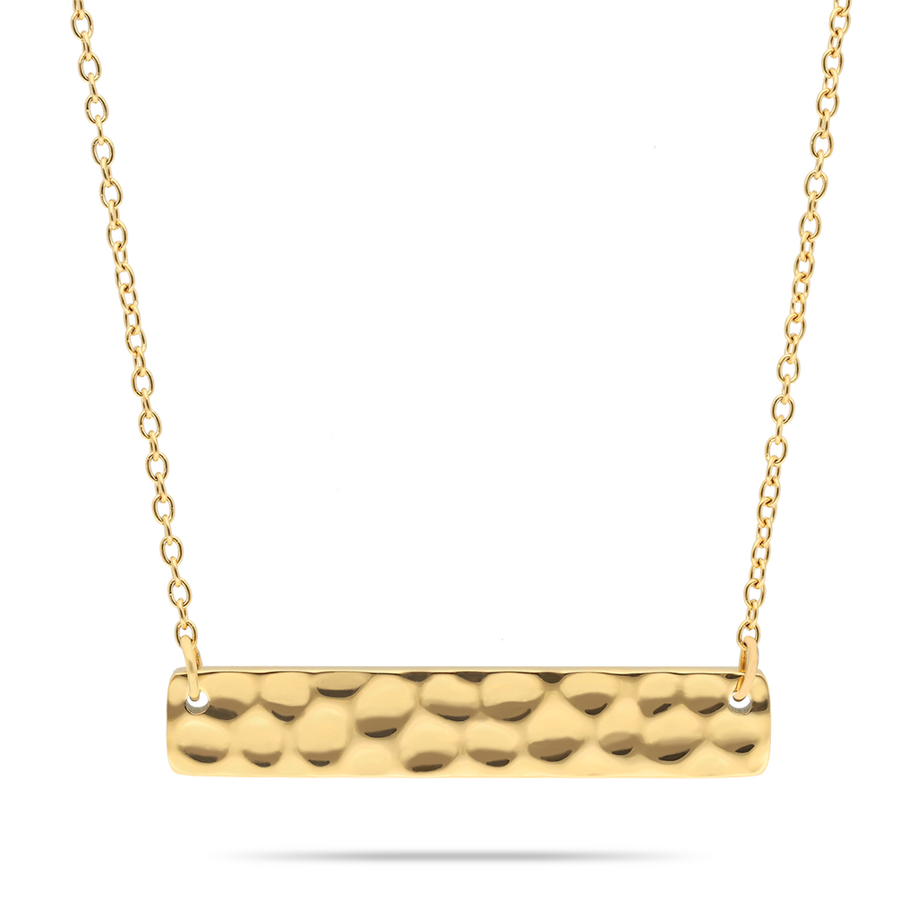 Barre d'or martelée