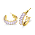 Boucle d'oreille en corail, or et pierres violettes