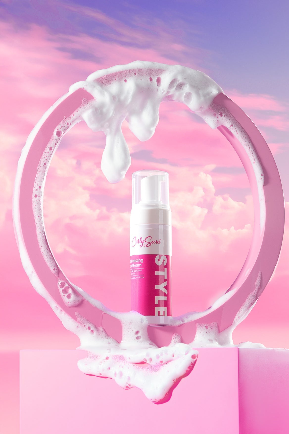 Mousse volumisante bouclante