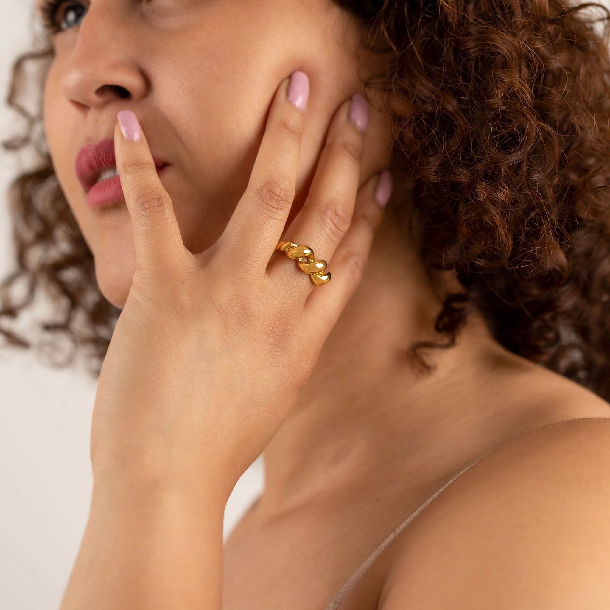 Bretzel audacieux bague or