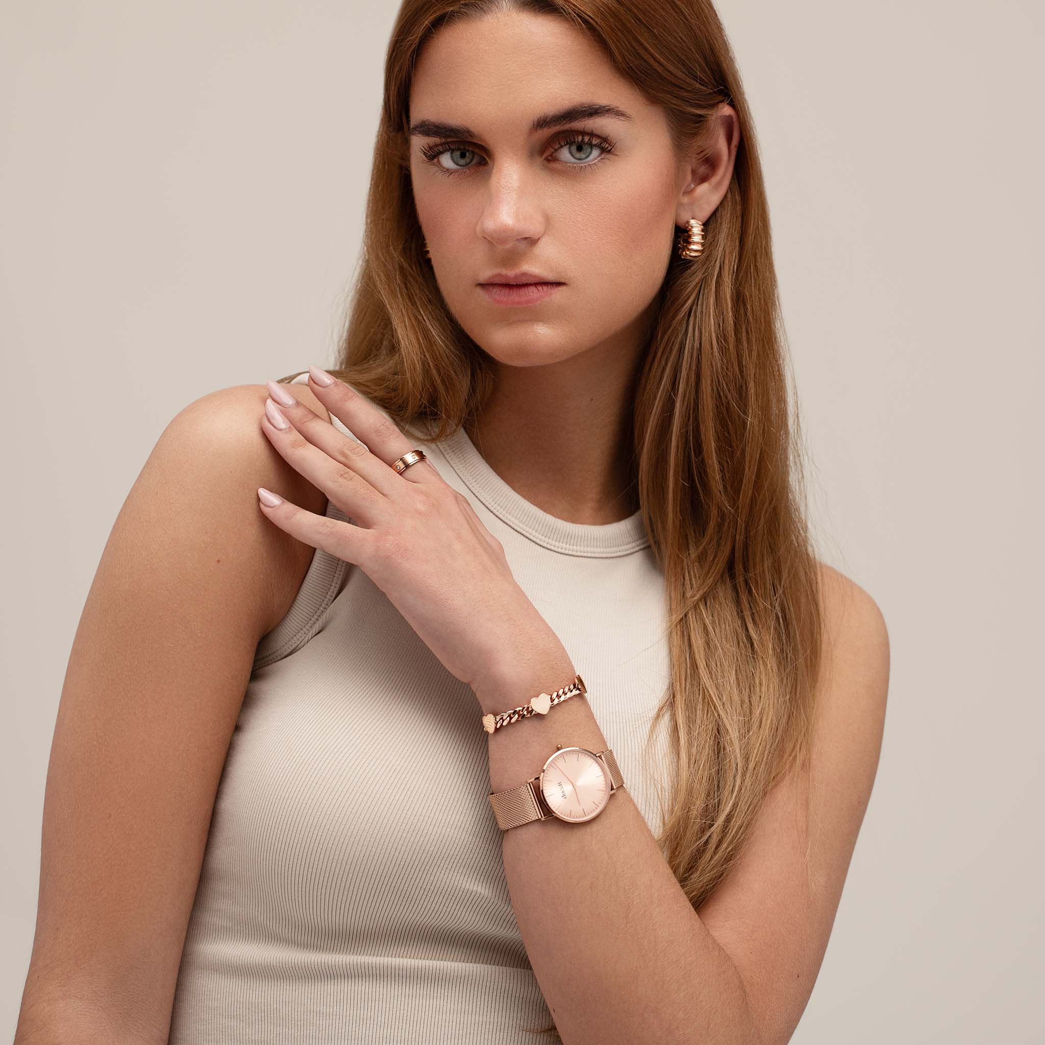 Boucle d'oreille vague en or rose