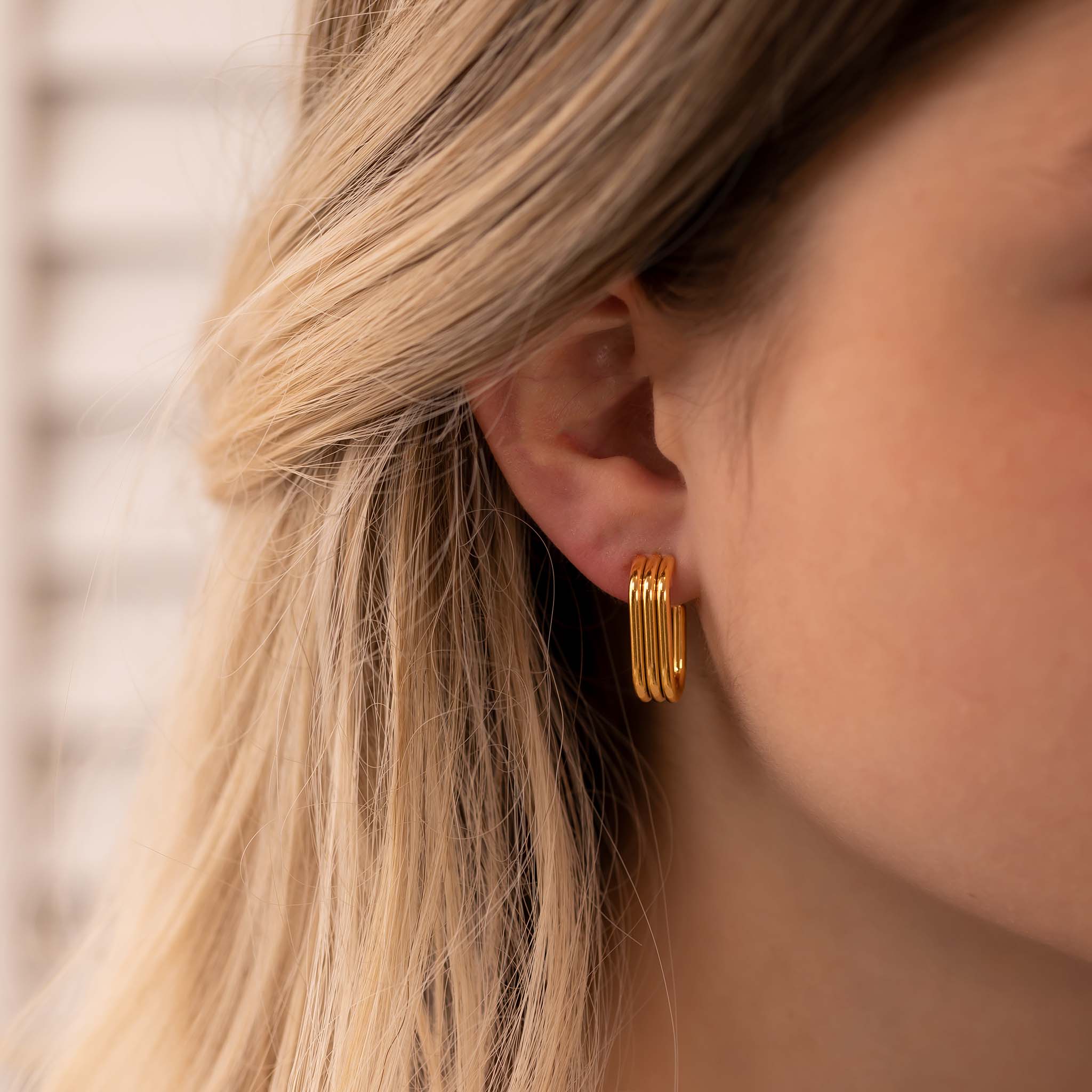 Boucle d'oreille Trinix or