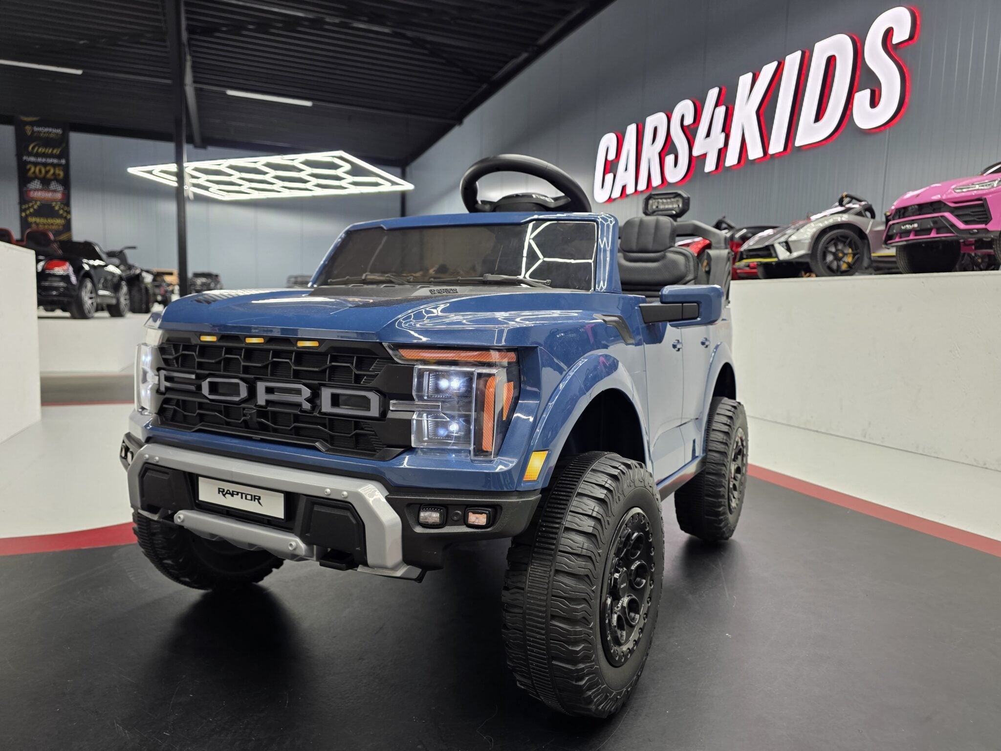 Ford Raptor 24V Electric Ride-On Truck – Blue 2-Seater with Remote Control, Bluetooth & LED Lights
