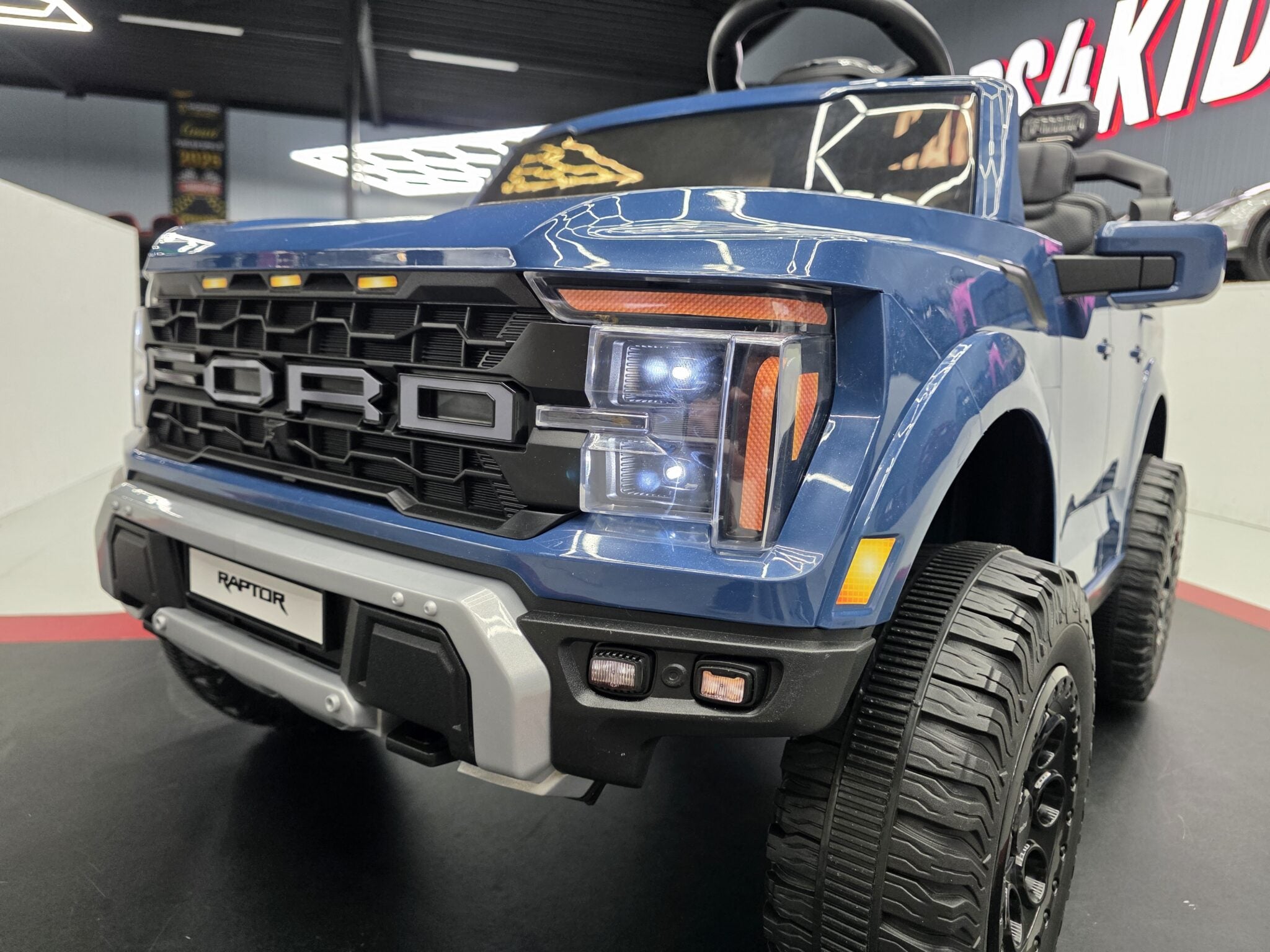 Ford Raptor 24V Electric Ride-On Truck – Blue 2-Seater with Remote Control, Bluetooth & LED Lights