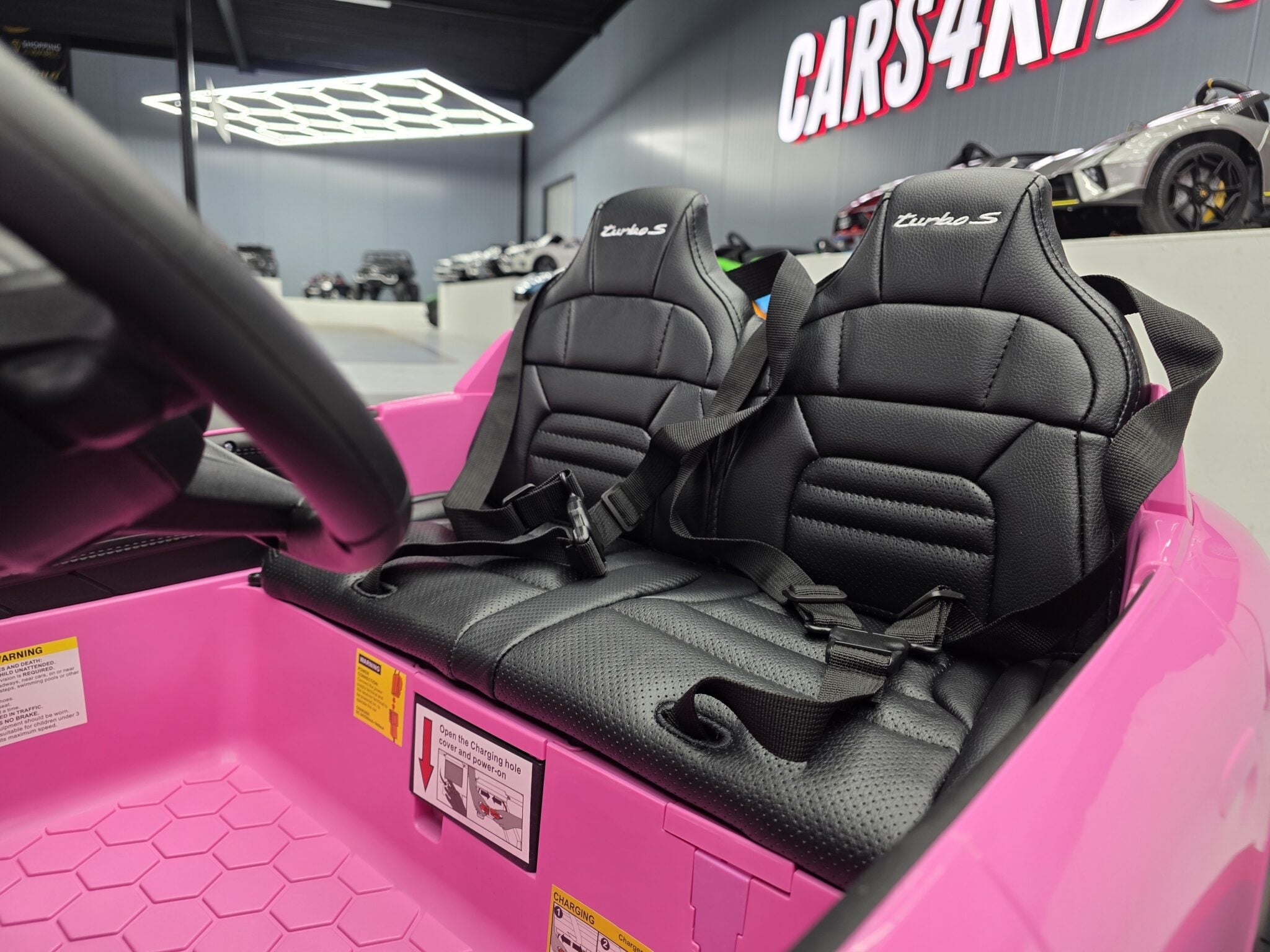Kinderauto Porsche Taycan 2-persoons 24 volt roze