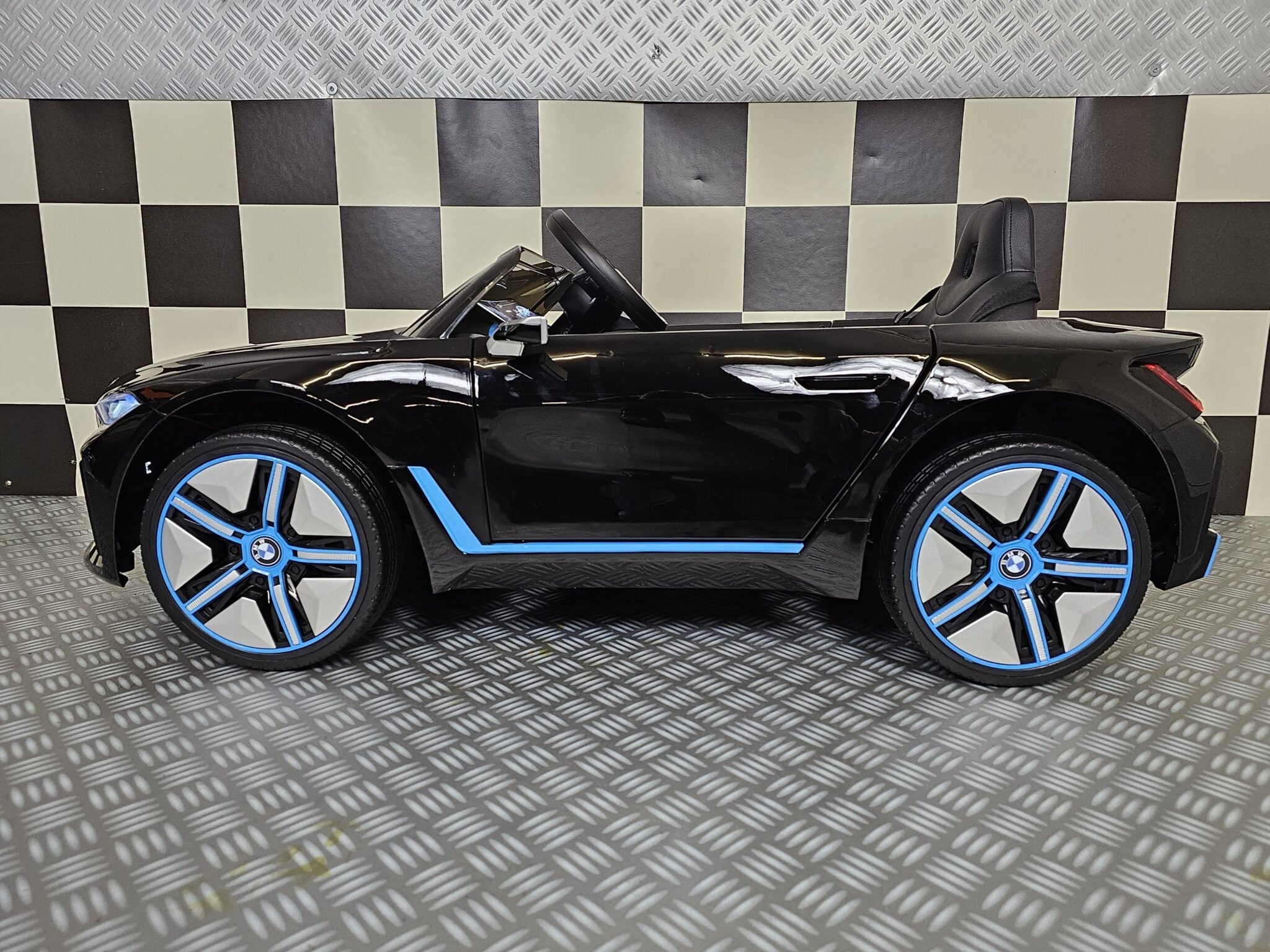 Elektrische kinderauto BMW i4 12 volt zwart