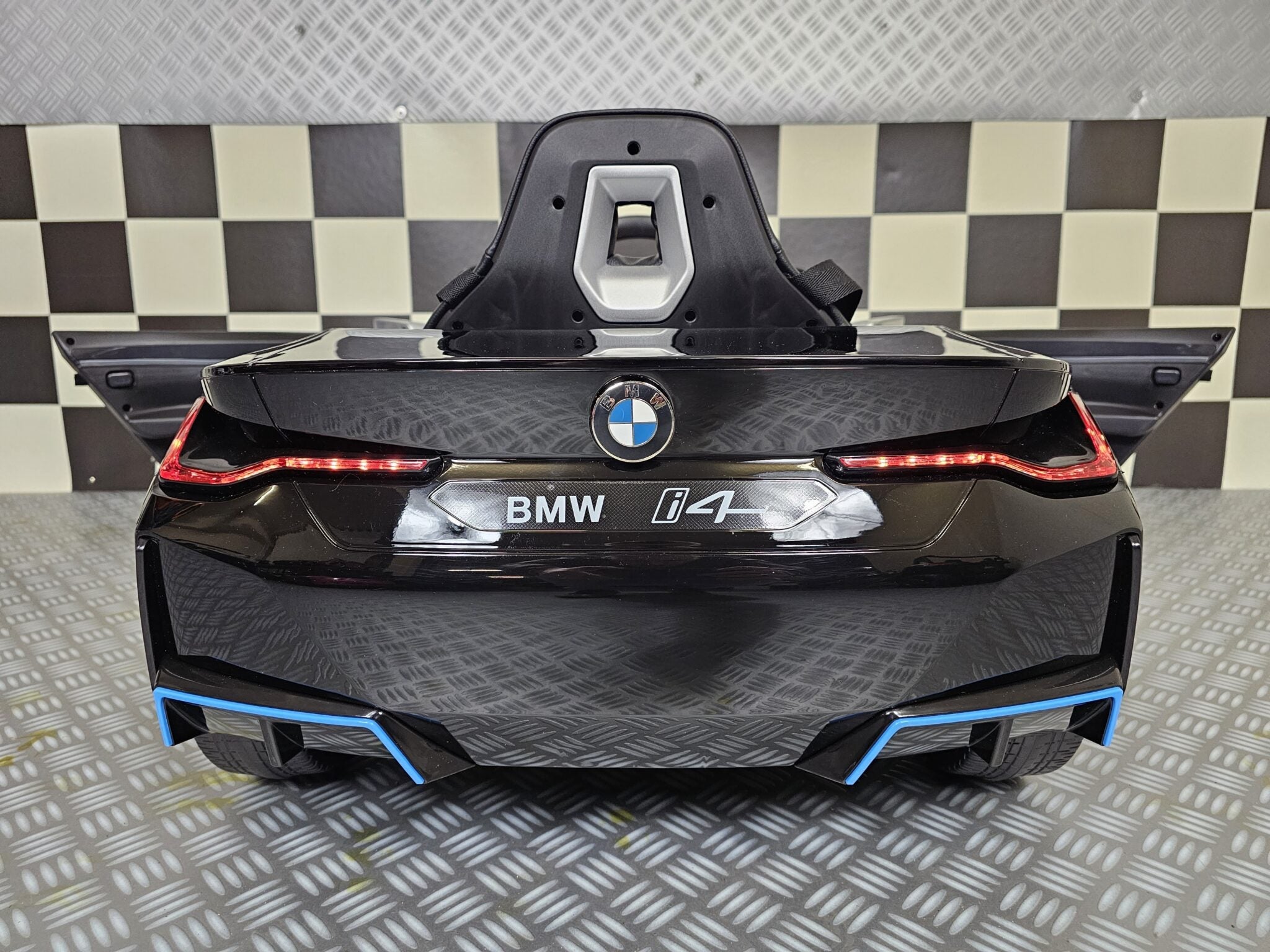 Elektrische kinderauto BMW i4 12 volt zwart