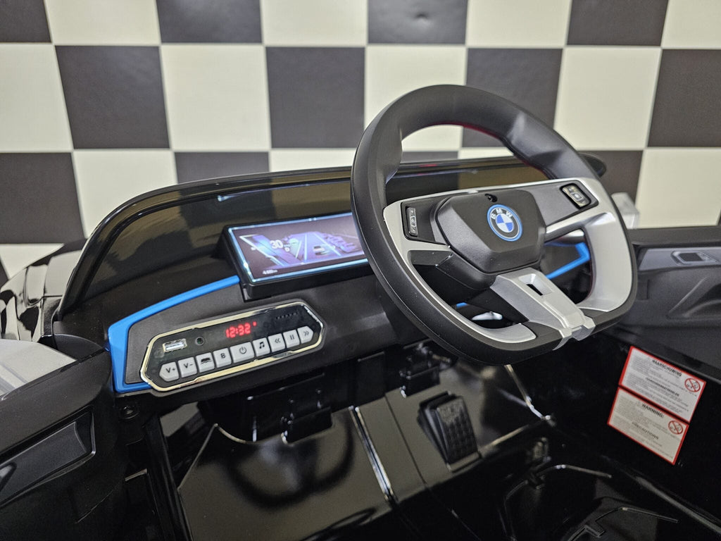 Elektrische kinderauto BMW i4 12 volt zwart