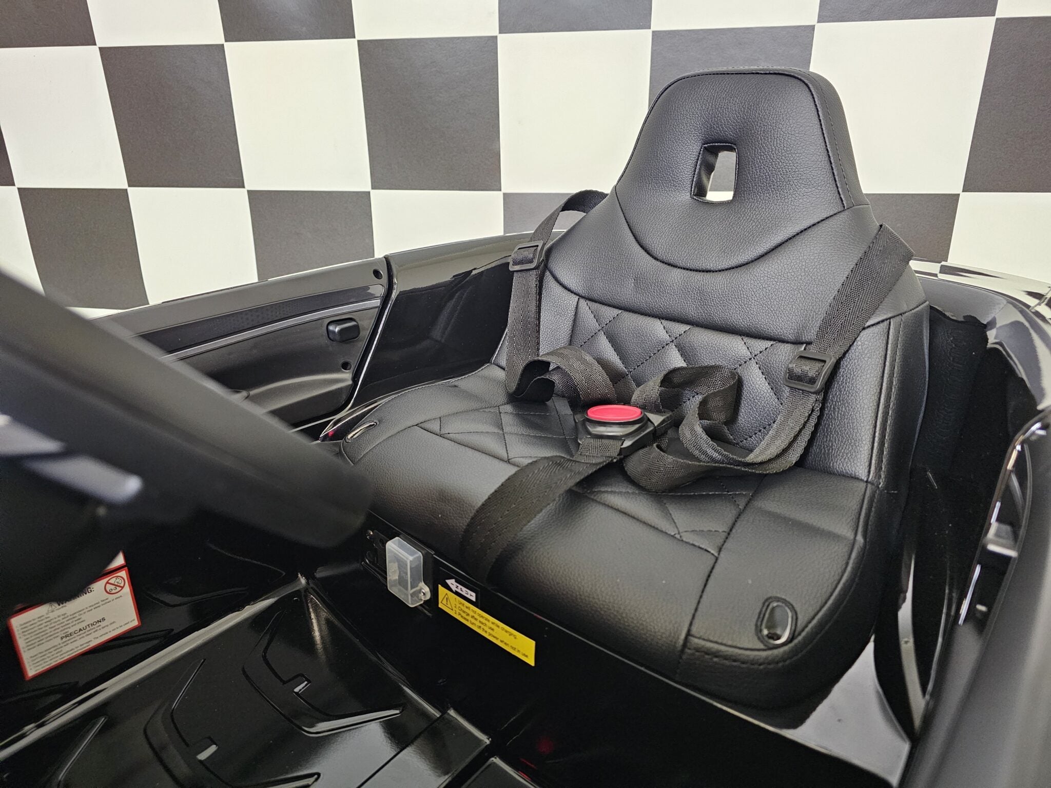 Elektrische kinderauto BMW i4 12 volt zwart