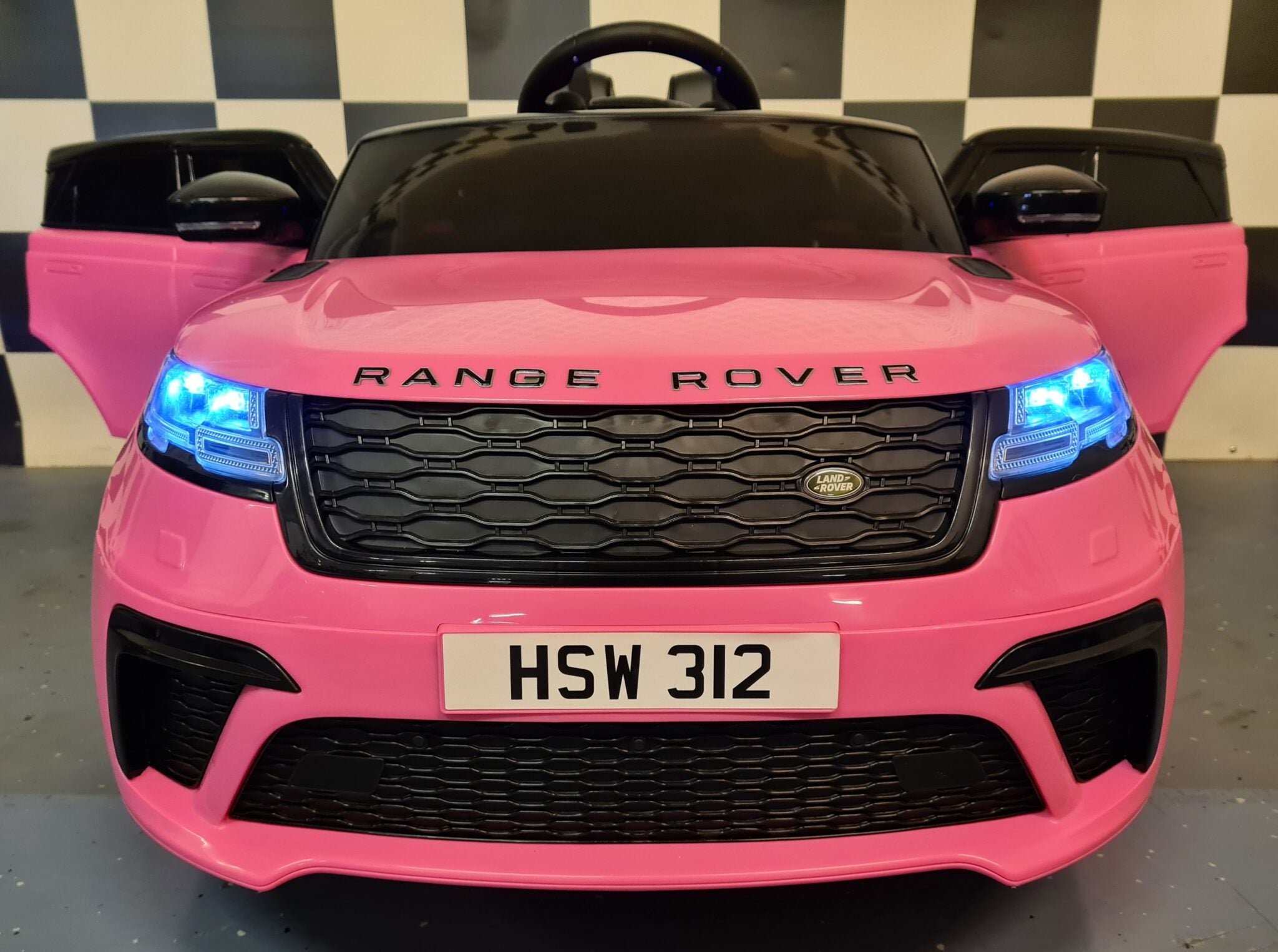 Range Rover Velar 12 volt 2,4 GHz RC roze batterij-aangedreven kinderauto