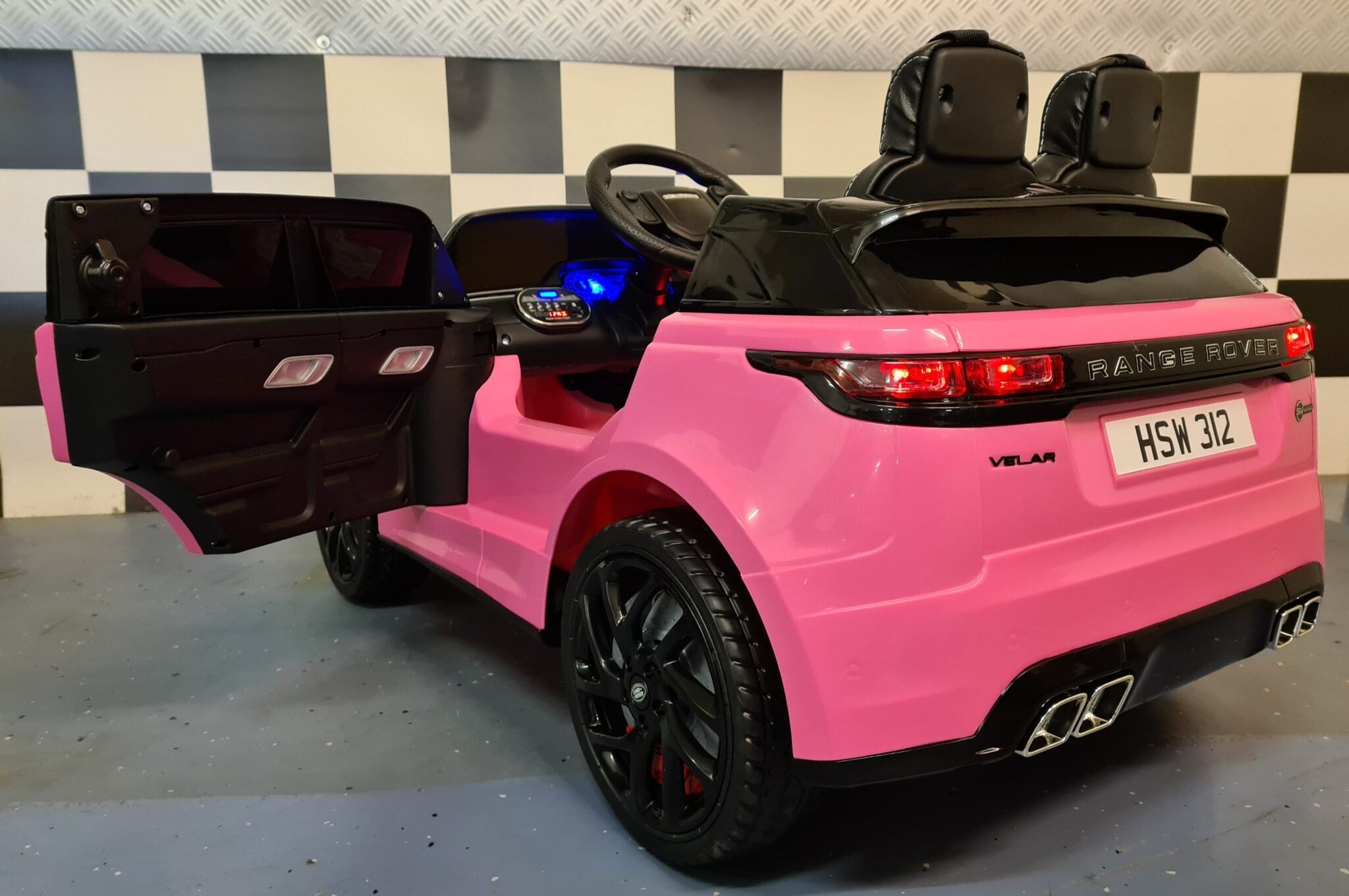Range Rover Velar 12 volt 2,4 GHz RC roze batterij-aangedreven kinderauto