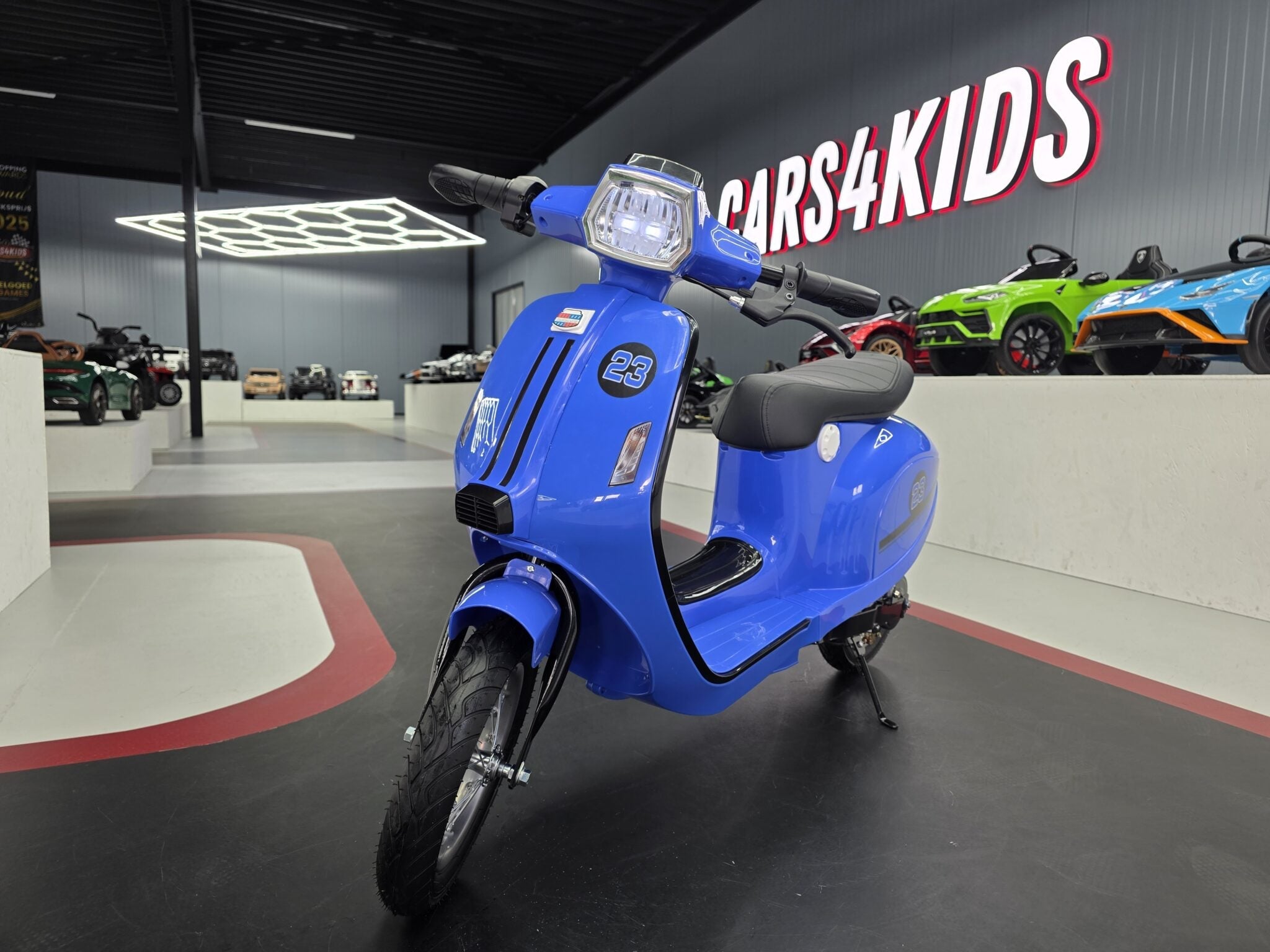 24V Electric Kids Scooter – Blue with Suspension & Leather Seat