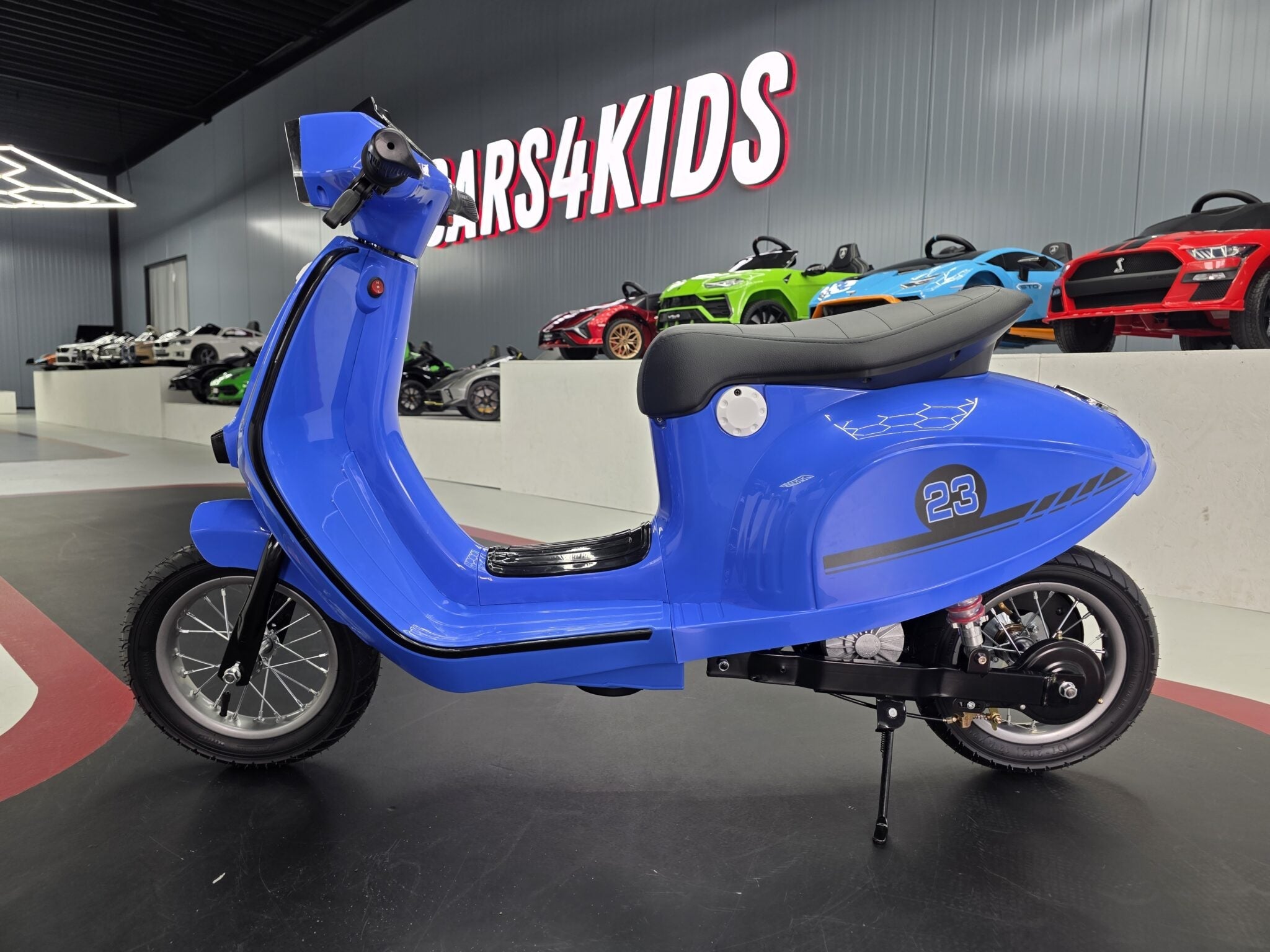 24V Electric Kids Scooter – Blue with Suspension & Leather Seat