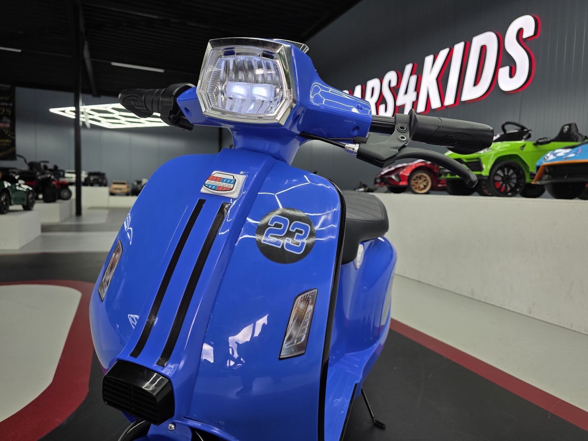 24V Electric Kids Scooter – Blue with Suspension & Leather Seat