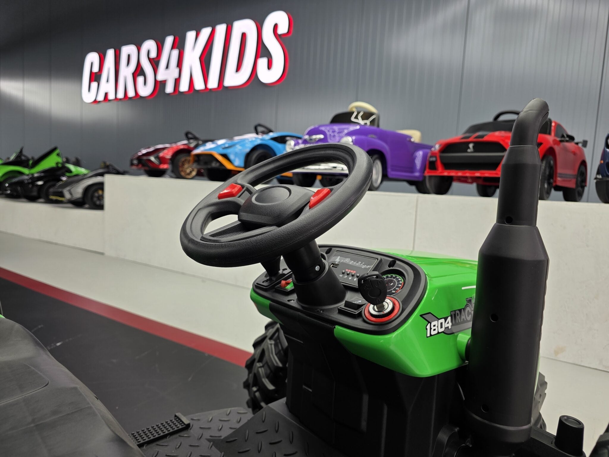 Kindertractor 24 volt met aanhanger en afstandsbediening