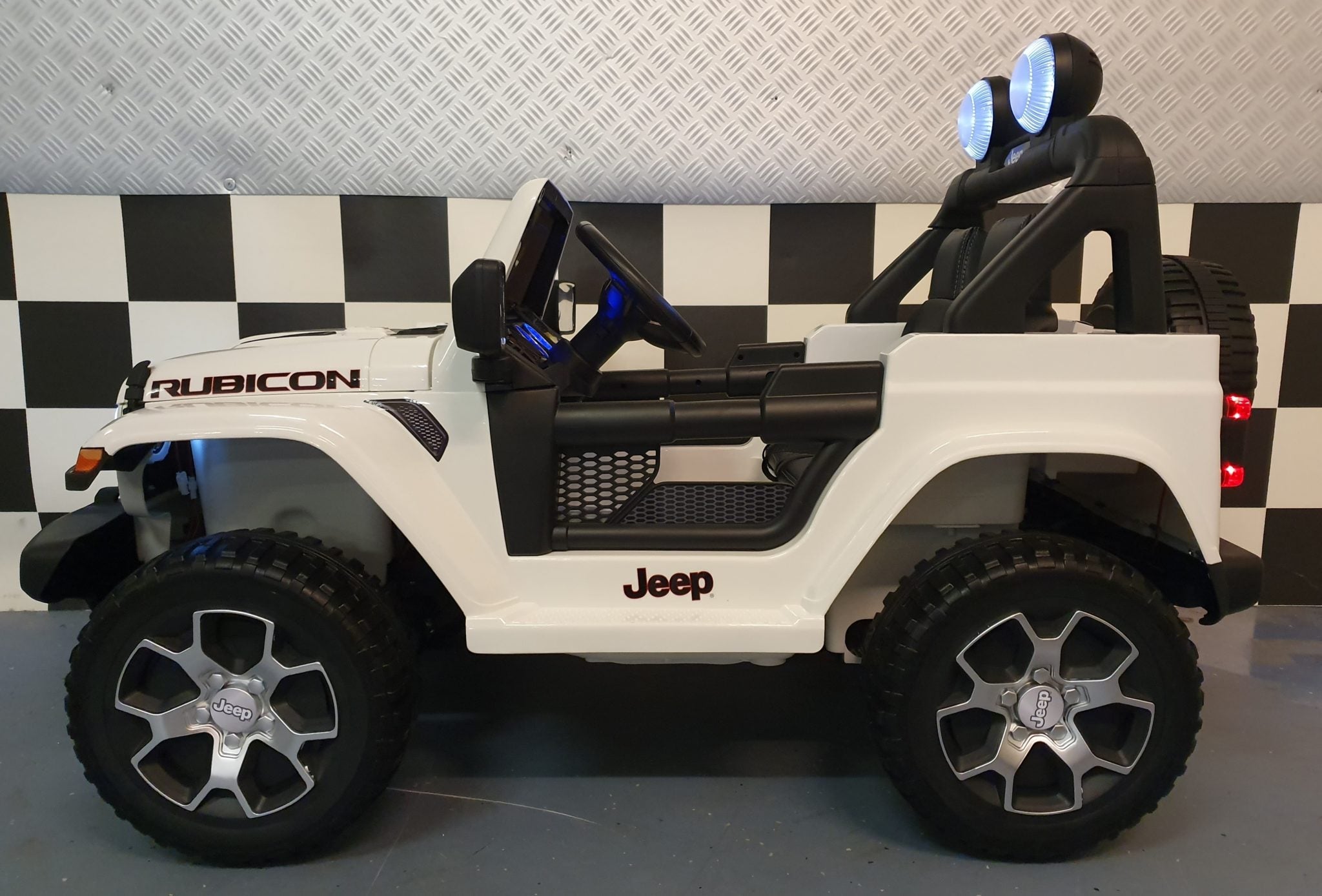 Jeep Wrangler kinderauto 12 volt vierwielaandrijving RC wit