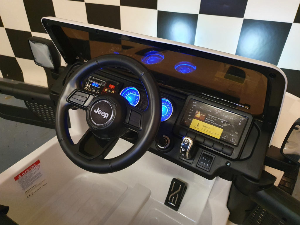 Jeep Wrangler kinderauto 12 volt vierwielaandrijving RC wit