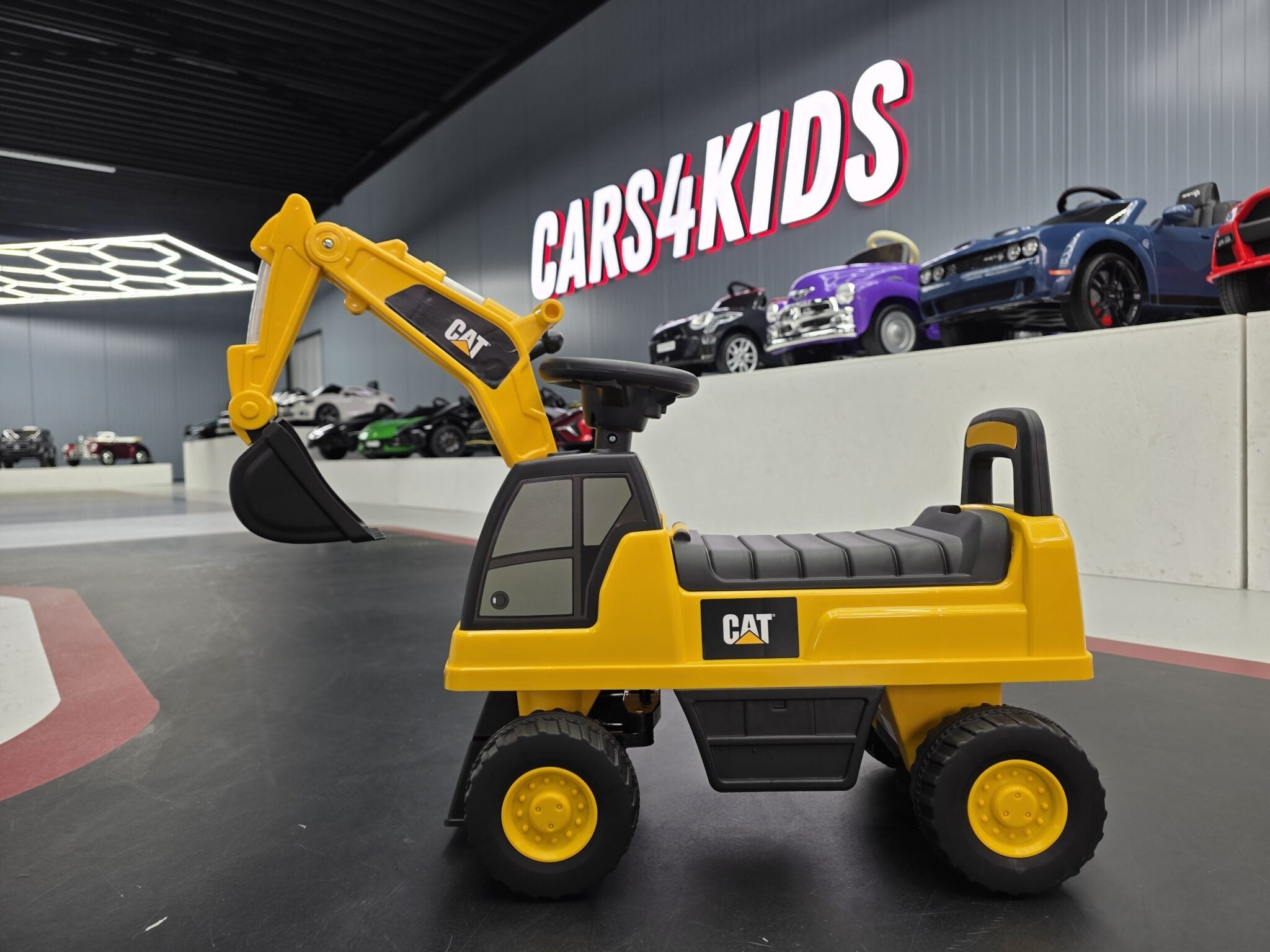Caterpillar Kids Walking Excavator – Foot-to-Floor Ride-On Digger