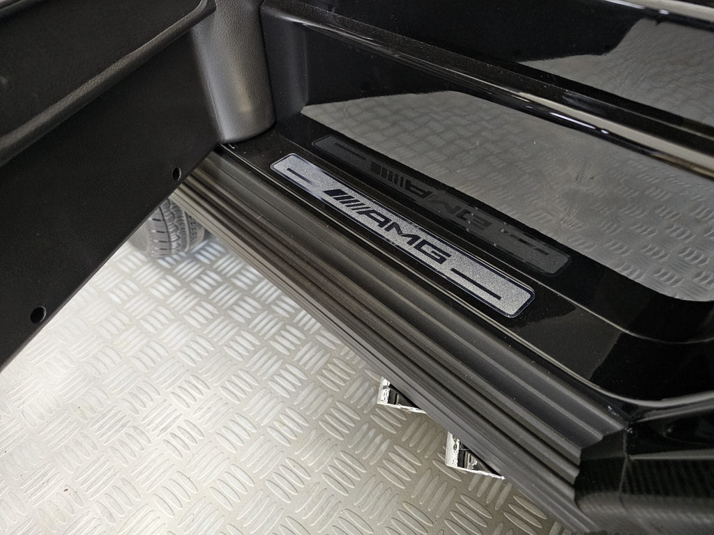 Elektrische kinderauto Mercedes G63 AMG 4×4 24 volt 2-persoons metallic zwart