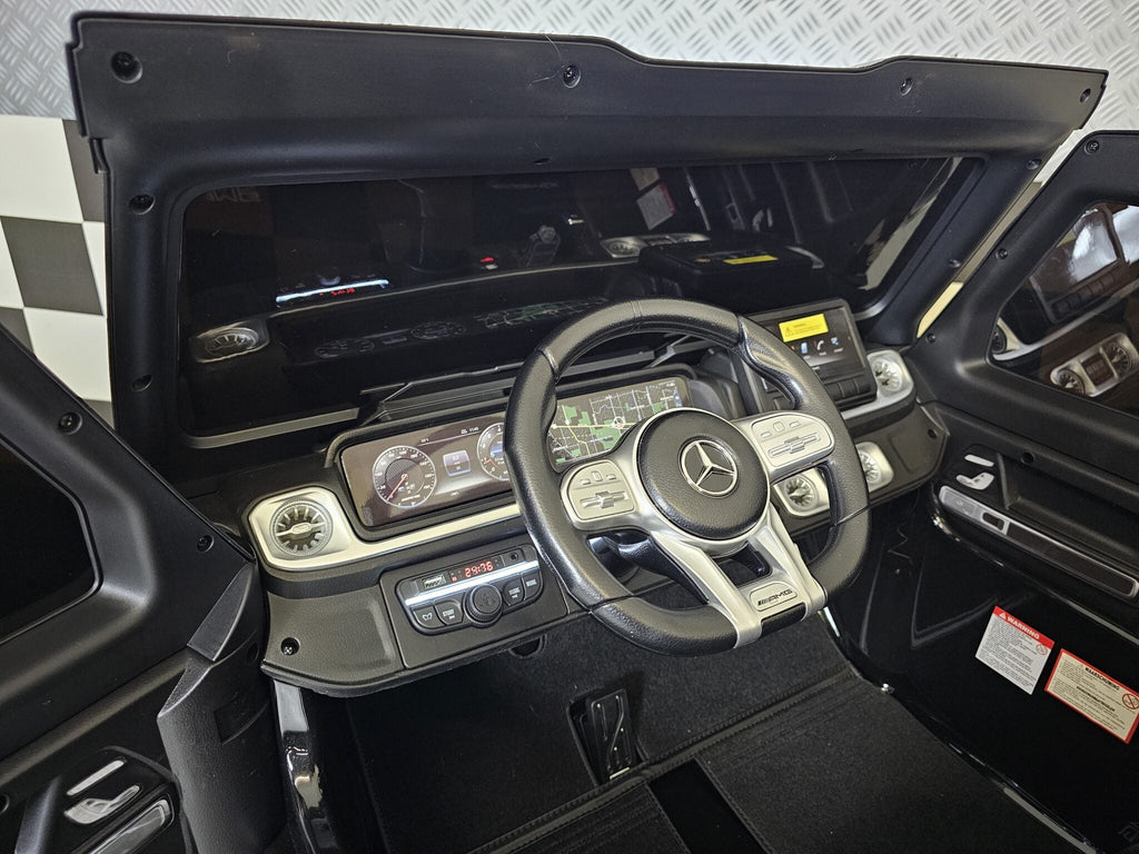 Elektrische kinderauto Mercedes G63 AMG 4×4 24 volt 2-persoons metallic zwart