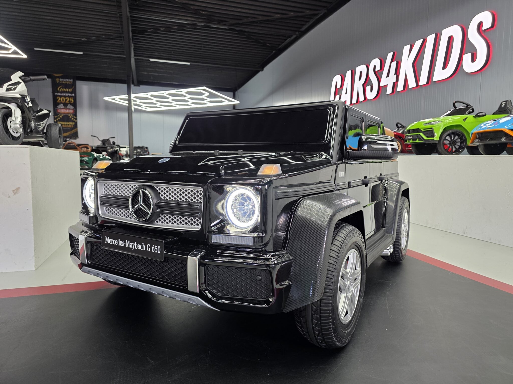 Mercedes Maybach XXL 24 volt elektrische kinderauto met MP4