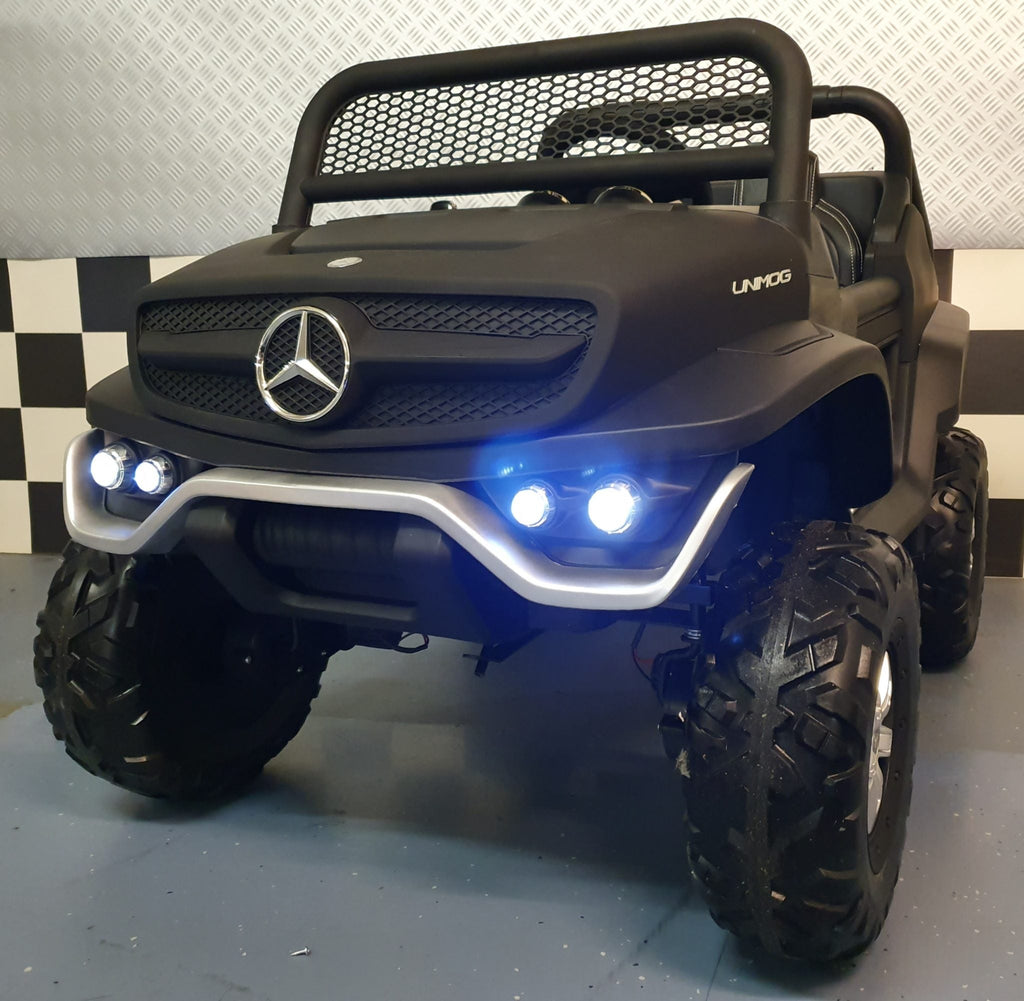 2-persoons Mercedes Unimog elektrische kinderauto 4x4 mat zwart